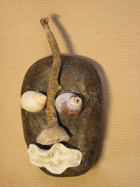 Homme coquillages